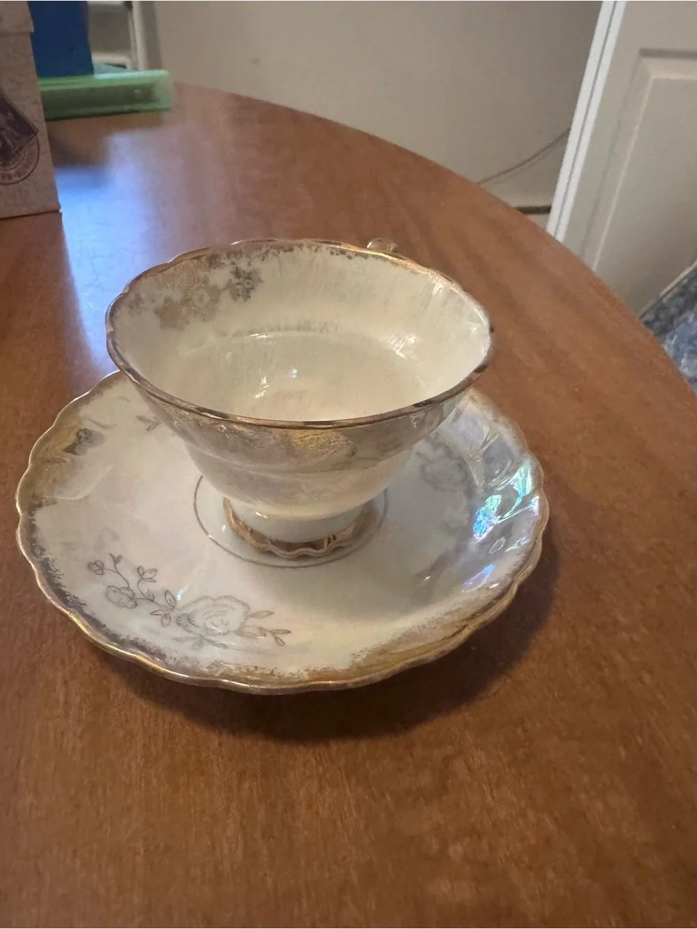 Porcelain Teacup and Saucer Set in White with Gold Trim